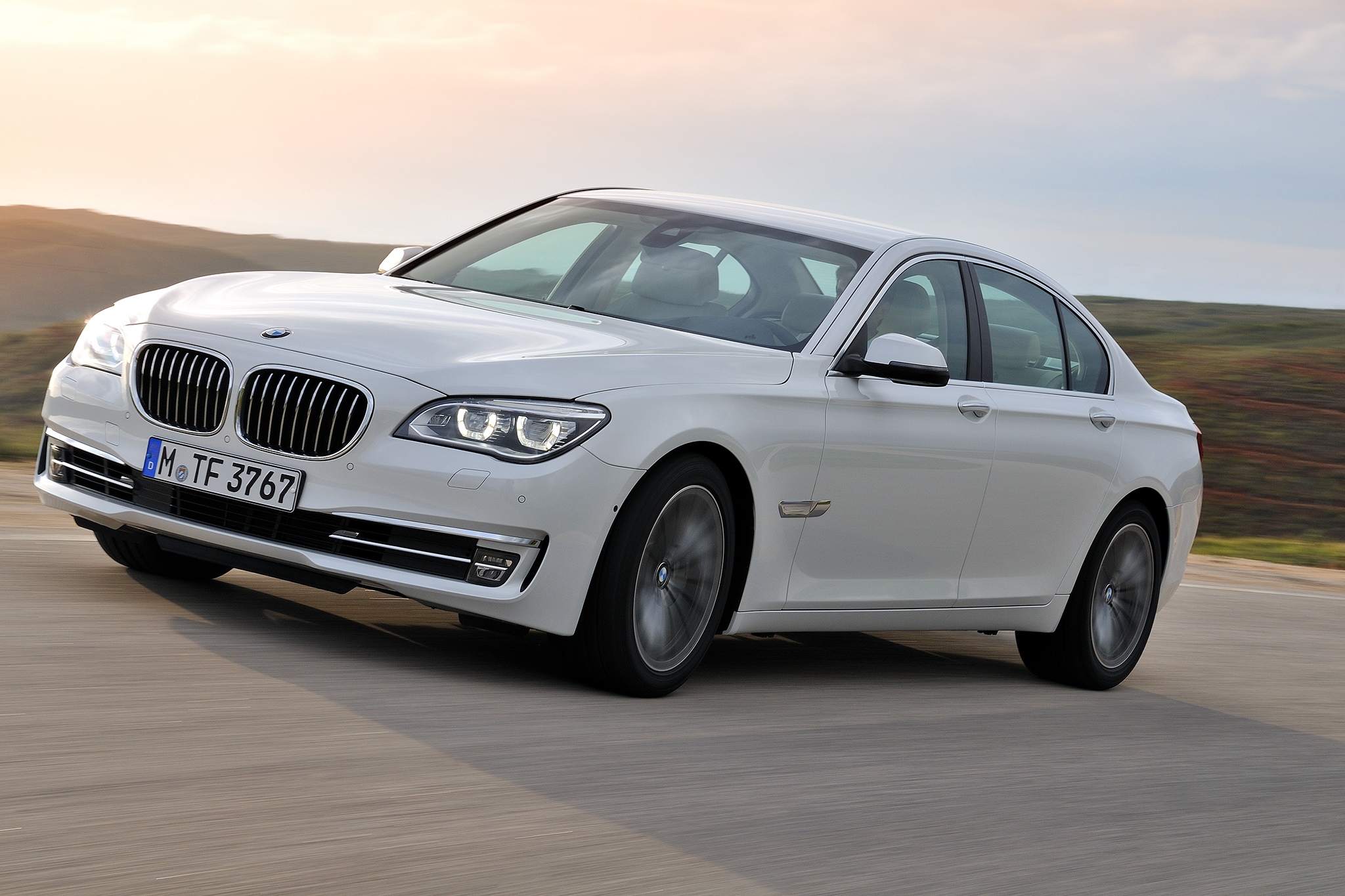 2014-bmw-7-series-front-three-quarters-in-motion